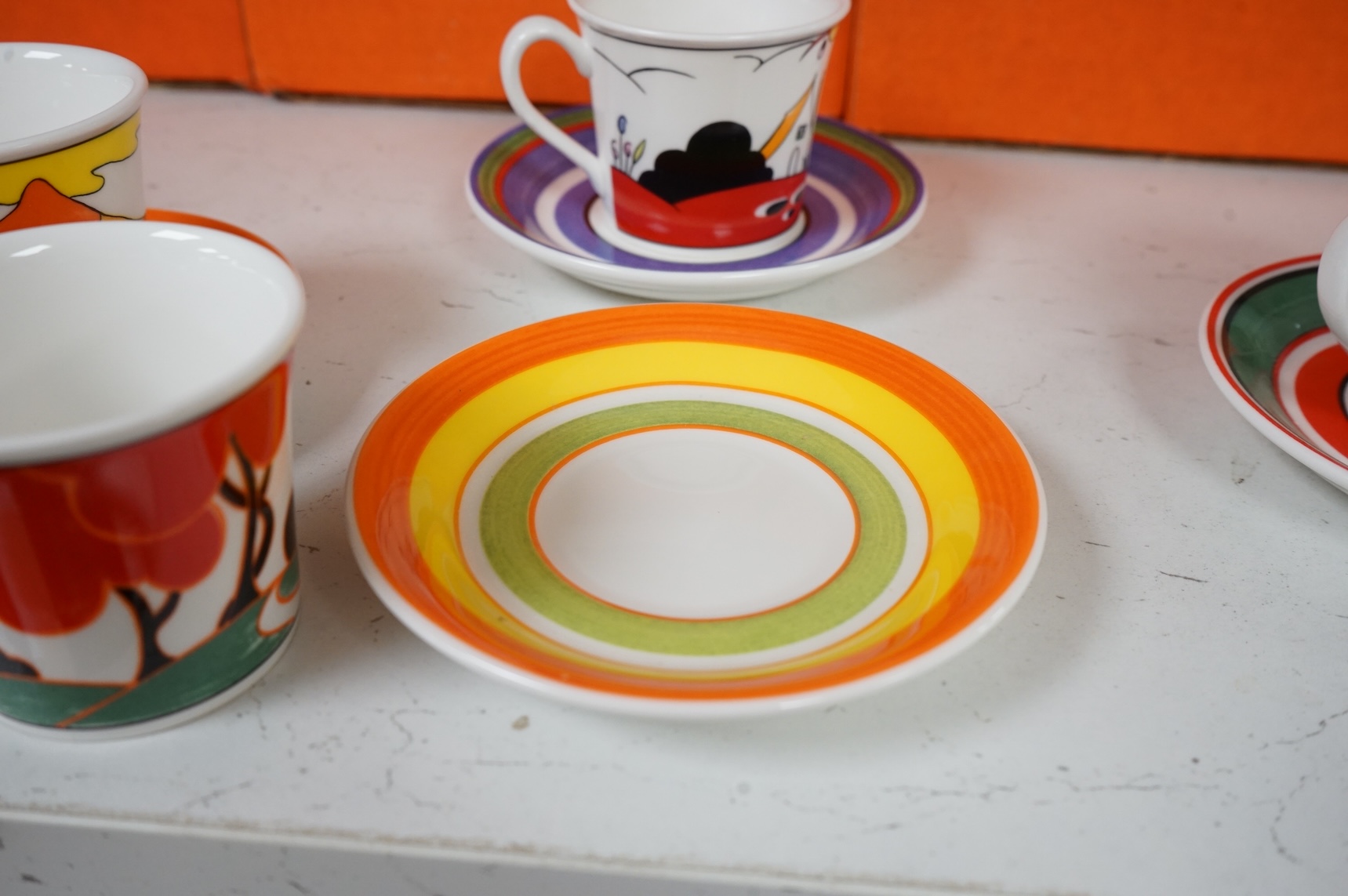 Four boxed limited edition Clarice Cliff cups and saucers to include Fantasque Mountain and Red Autumn, saucers 11.5cm in diameter